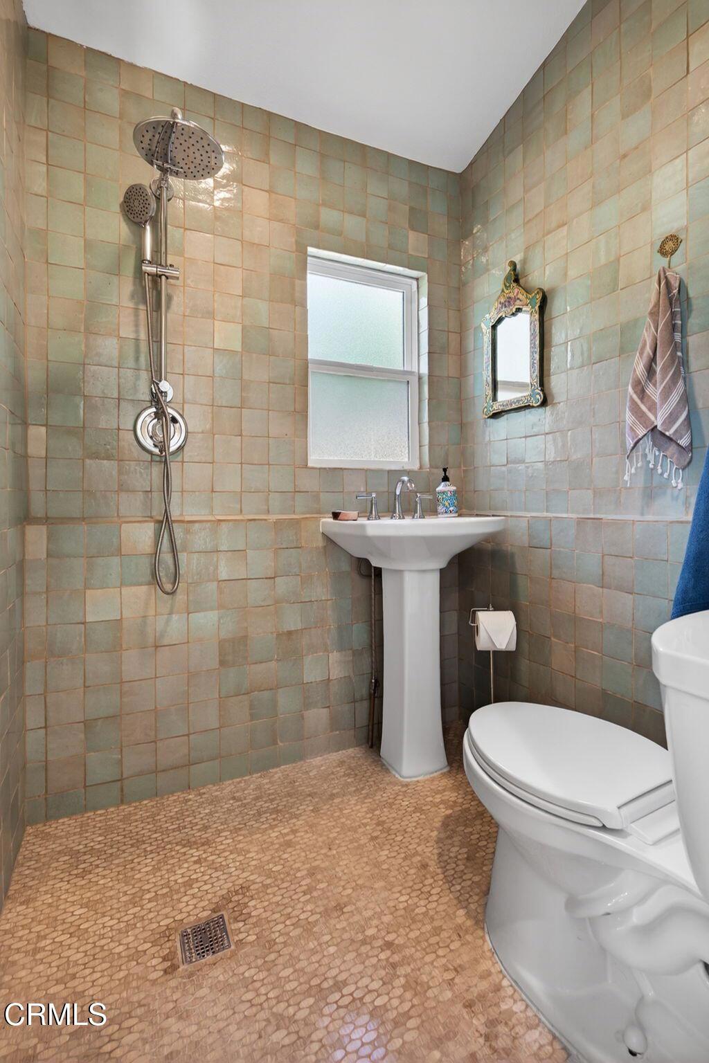 559 North Loop Drive Camarillo, CA 93010 - Photo 51 of 76 a bathroom with a sink toilet and shower
