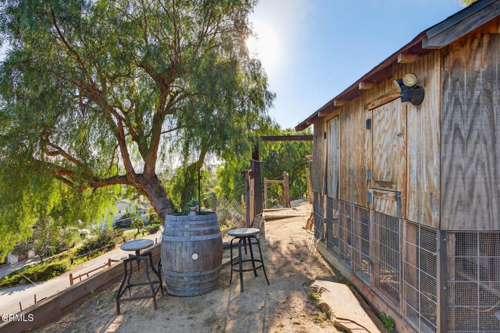 559 North Loop Drive Camarillo, CA 93010 - Photo 62 of 76 a view of a patio with table and chairs and potted plants