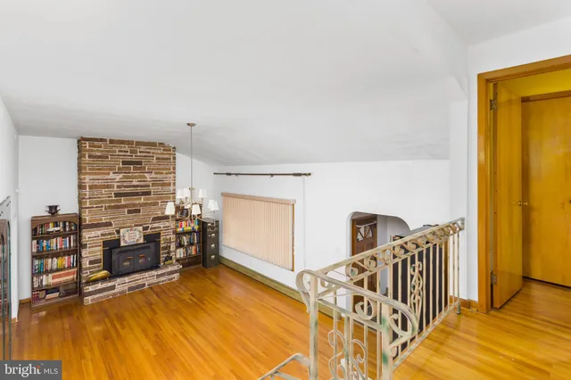 a view of a livingroom with furniture and windows