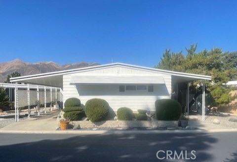 2230 Lake Park Drive, Unit 113 San Jacinto, CA 92583 - Photo 1 of 25 a view of a back yard of the house