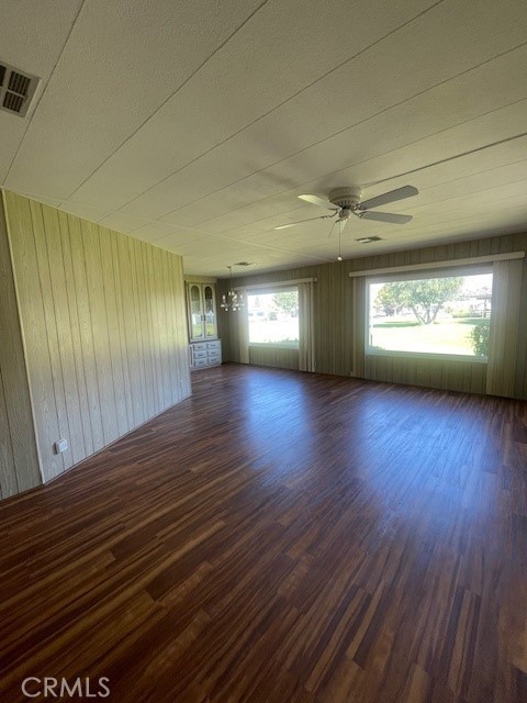 2230 Lake Park Drive, Unit 113 San Jacinto, CA 92583 - Photo 11 of 25 a view of an empty room with window and wooden floor