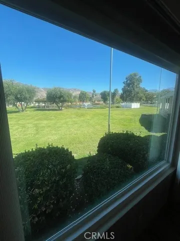 a view of a lake from a balcony