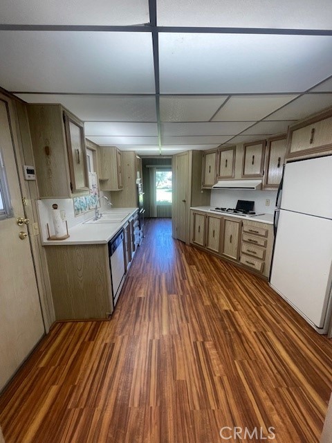 2230 Lake Park Drive, Unit 113 San Jacinto, CA 92583 - Photo 15 of 25 a kitchen with stainless steel appliances granite countertop a lot of counter space and wooden floors
