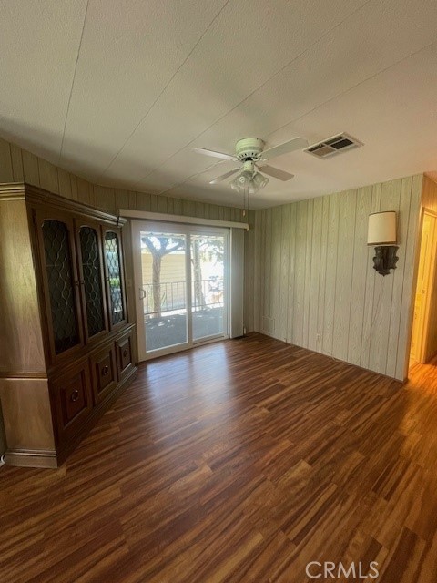 2230 Lake Park Drive, Unit 113 San Jacinto, CA 92583 - Photo 18 of 25 a view of an empty room with window and wooden floor