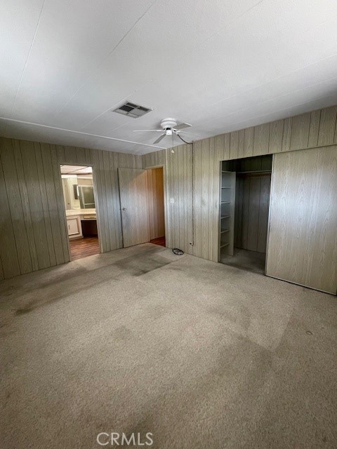 2230 Lake Park Drive, Unit 113 San Jacinto, CA 92583 - Photo 20 of 25 an empty room with entrance and windows