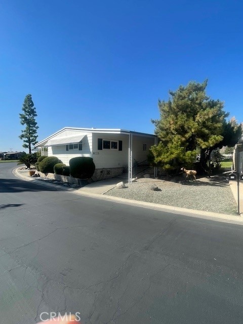 2230 Lake Park Drive, Unit 113 San Jacinto, CA 92583 - Photo 2 of 25 a car parked on the side of the road