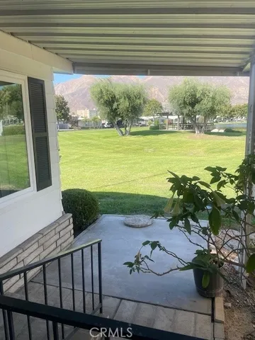 a view of a swimming pool and an outdoor space