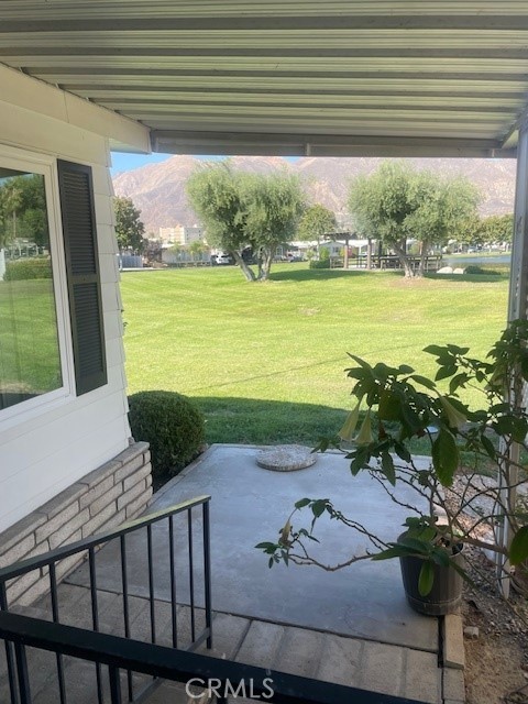 2230 Lake Park Drive, Unit 113 San Jacinto, CA 92583 - Photo 4 of 25 a view of a swimming pool and an outdoor space