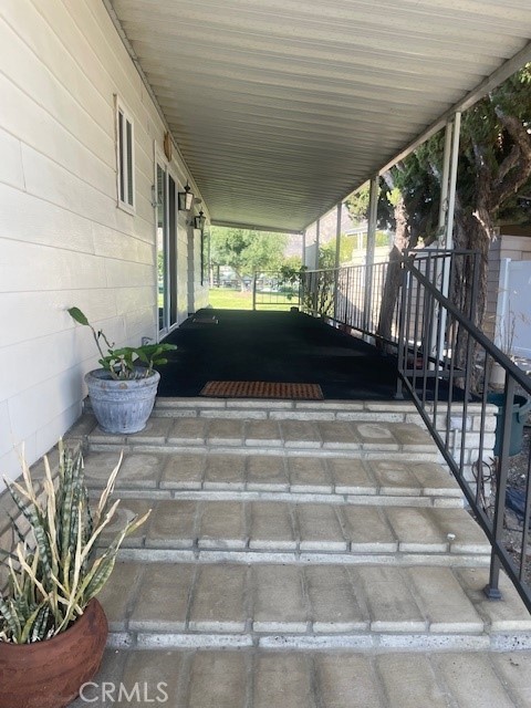 2230 Lake Park Drive, Unit 113 San Jacinto, CA 92583 - Photo 6 of 25 a view of balcony with wooden floor