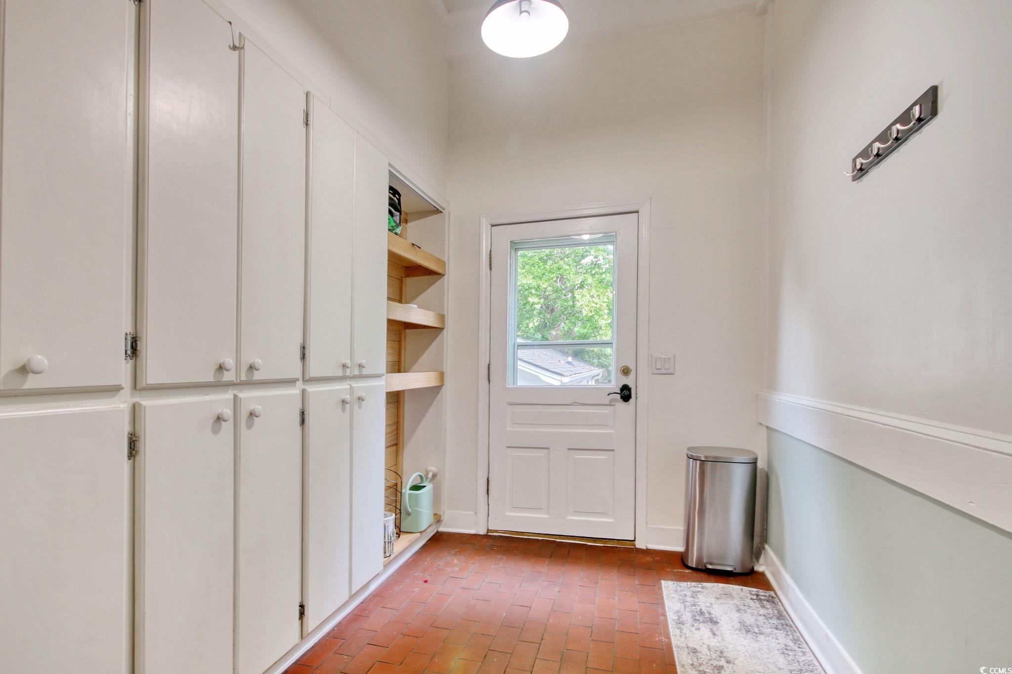 100 Northeast Ct Street Marion, SC 29571 - Photo 21 of 40 Entryway with brick floors and baseboards