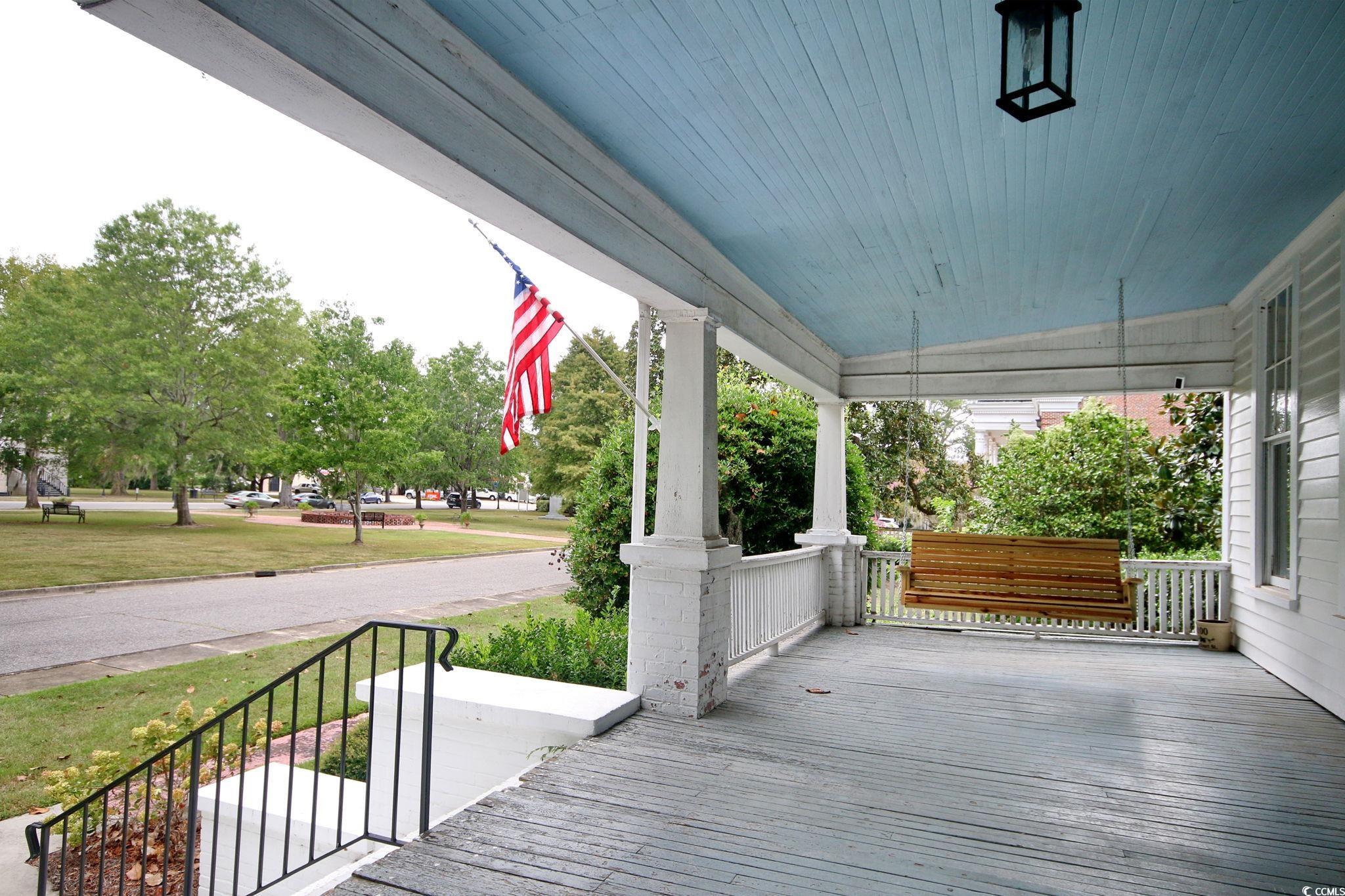 100 Northeast Ct Street Marion, SC 29571 - Photo 7 of 40 View of wooden porch