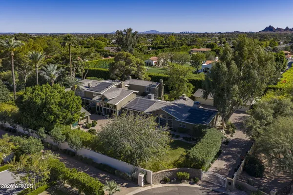 an aerial view of residential house with outdoor space