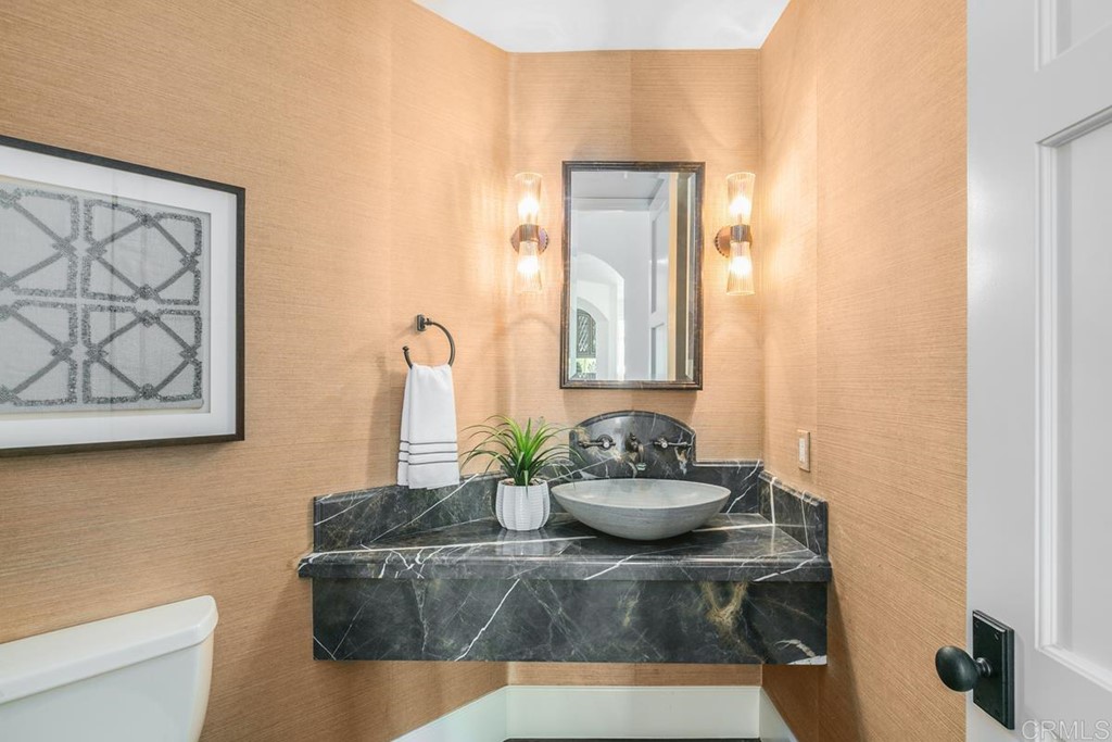 14910 Rancho Nuevo Del Mar, CA 92014 - Photo 16 of 54 a living room with furniture and a potted plant