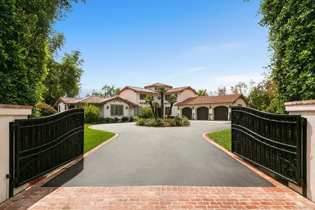 14910 Rancho Nuevo Del Mar, CA 92014 - Photo 3 of 54 a view of a house with pool and chairs