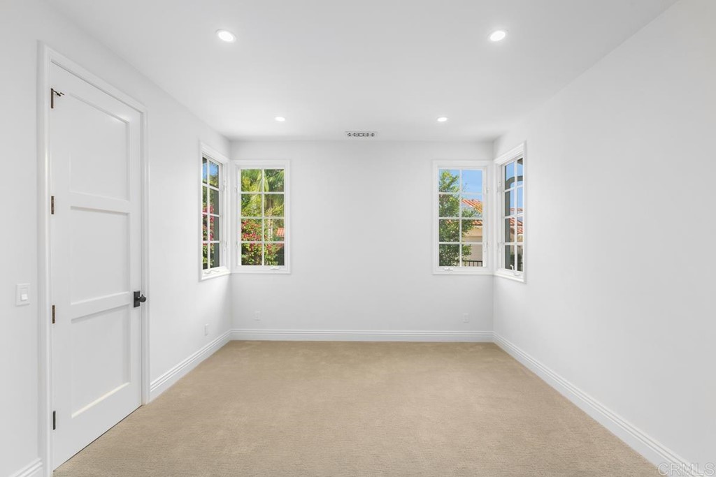 14910 Rancho Nuevo Del Mar, CA 92014 - Photo 33 of 54 an empty room with windows