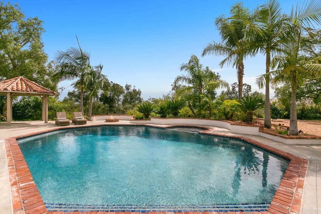 14910 Rancho Nuevo Del Mar, CA 92014 - Photo 40 of 54 a view of a swimming pool with a patio