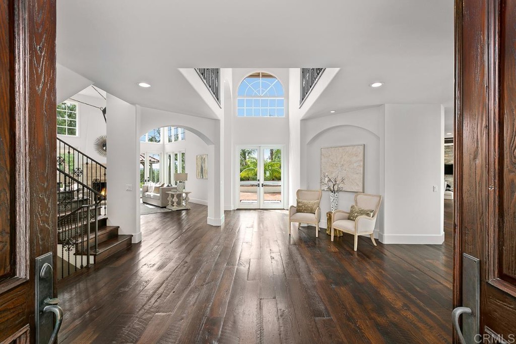 14910 Rancho Nuevo Del Mar, CA 92014 - Photo 6 of 54 a living room with furniture or wooden floor and a large window