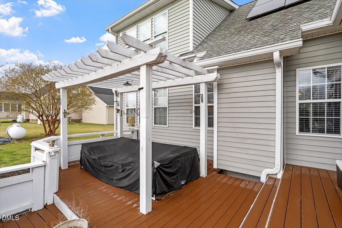 118 Victory Circle Willow Spring, NC 27592 - Photo 11 of 42 a backyard of a house with wooden floor