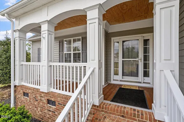 a view of a chairs and table in the deck
