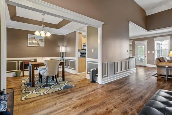 a backyard of a house with wooden floor