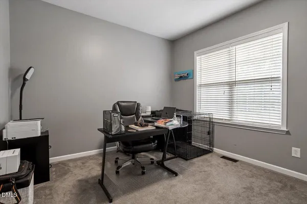 a kitchen with sink and window
