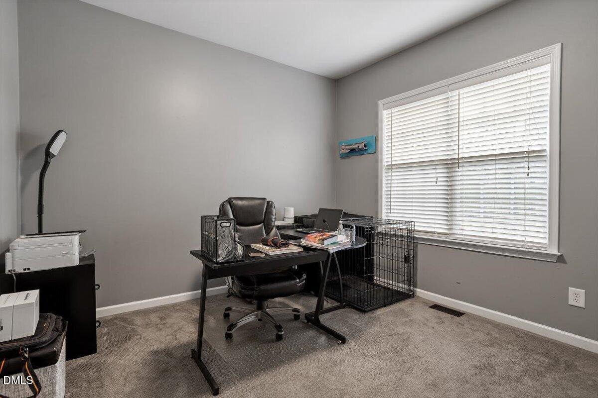 118 Victory Circle Willow Spring, NC 27592 - Photo 25 of 42 a view of a workspace with a window