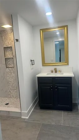 a bathroom with a toilet and a sink
