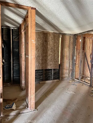 a view of a hallway with wooden building