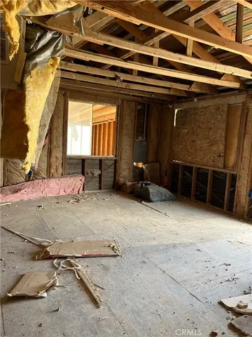 a bathroom with a tub and a shower