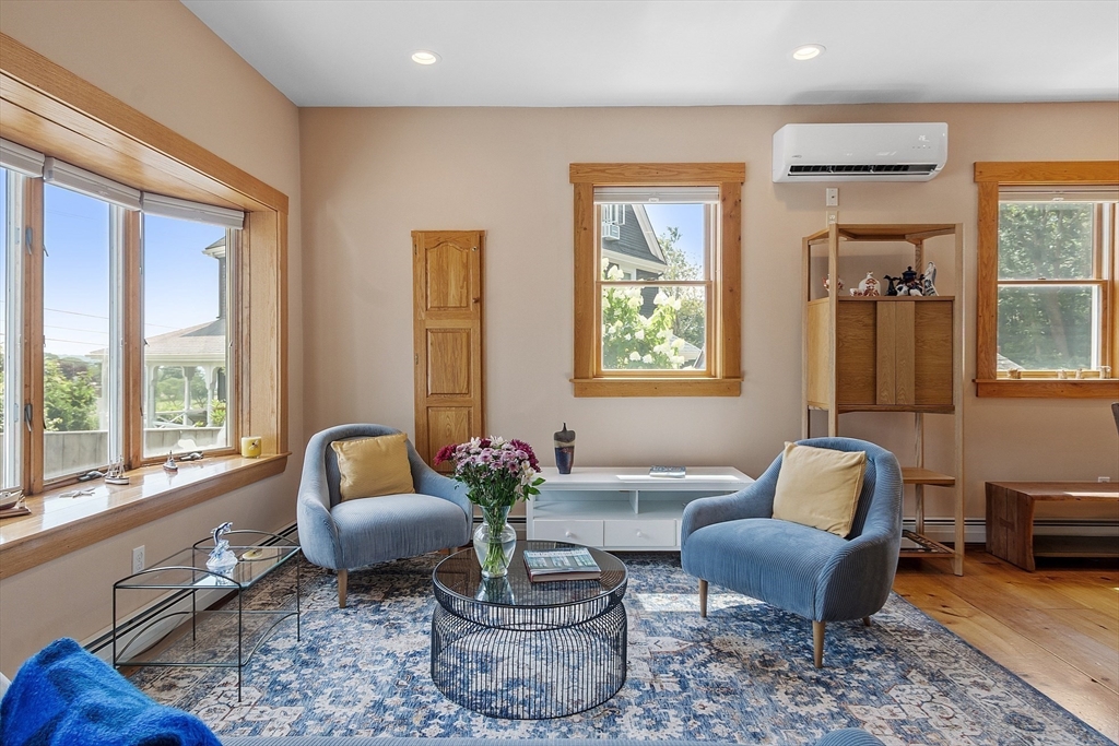 205 R Western Avenue Gloucester, MA 01930 - Photo 3 of 30 a living room with furniture and a window