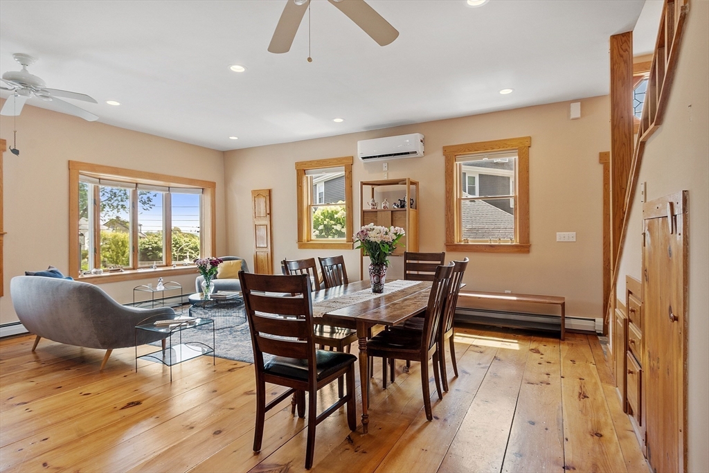 205 R Western Avenue Gloucester, MA 01930 - Photo 5 of 30 a view of a dining room with furniture window and wooden floor
