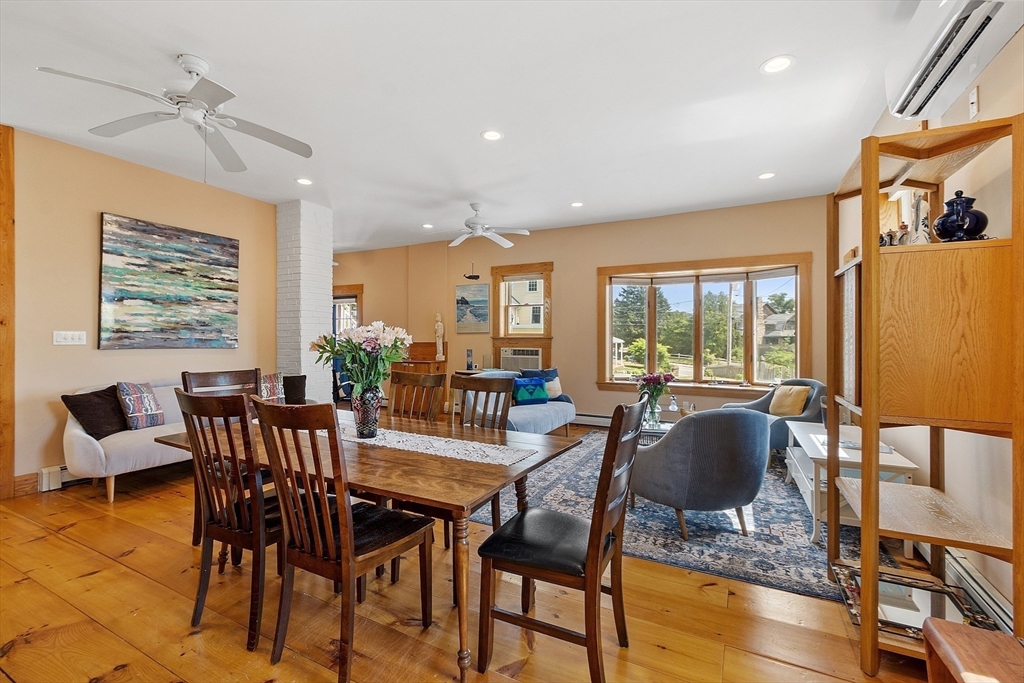 205 R Western Avenue Gloucester, MA 01930 - Photo 6 of 30 a view of a dining room with furniture window and wooden floor