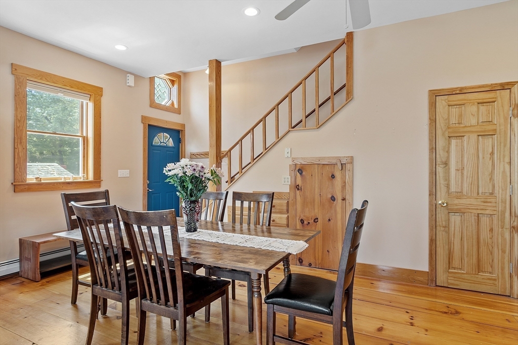 205 R Western Avenue Gloucester, MA 01930 - Photo 7 of 30 a view of a dining room with furniture window and wooden floor