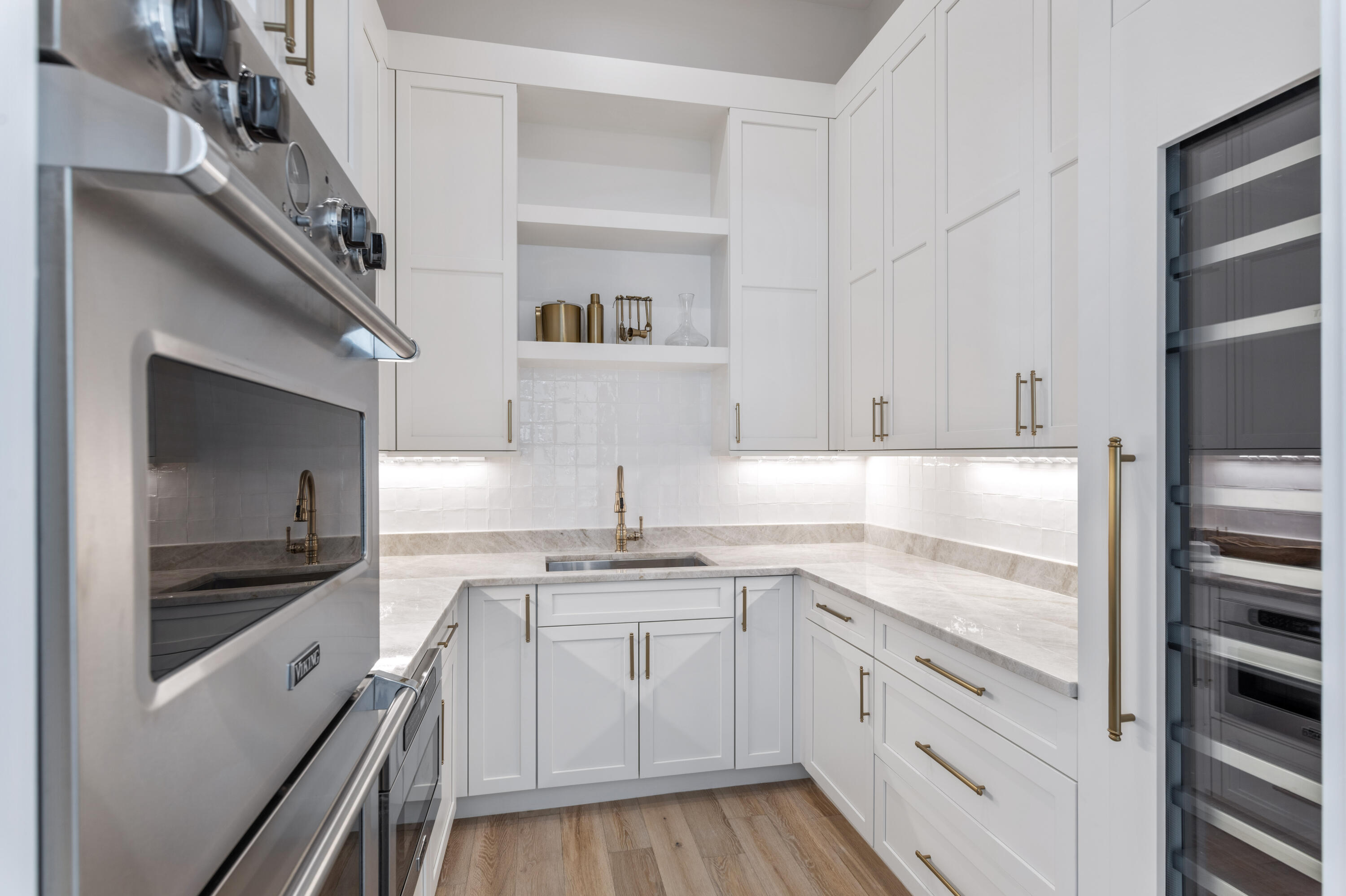 140 South Wall Street Inlet Beach, FL 32461 - Photo 28 of 82 a kitchen with a sink dishwasher a stove and a refrigerator