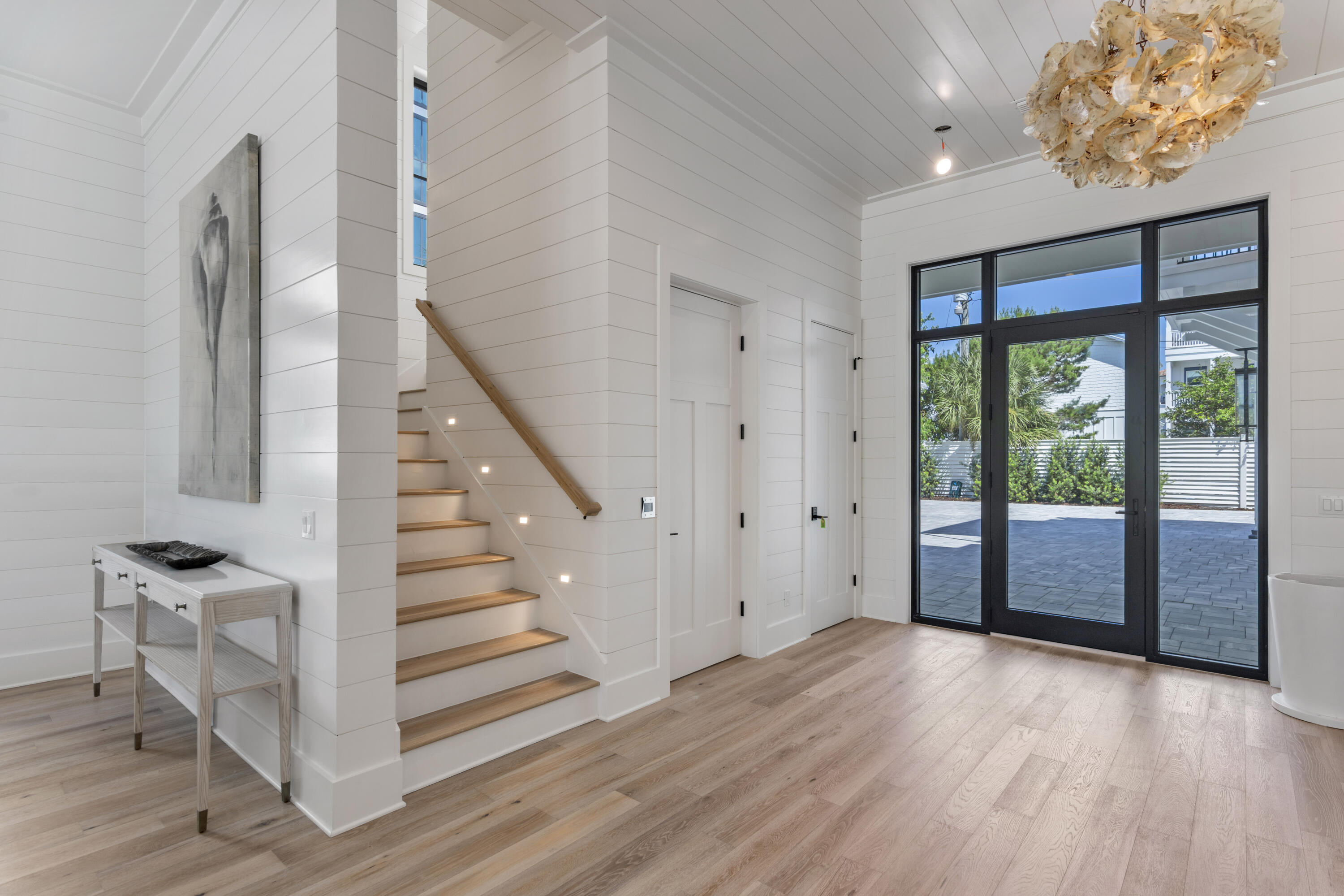 140 South Wall Street Inlet Beach, FL 32461 - Photo 3 of 82 a view of entryway with wooden floor and stairs