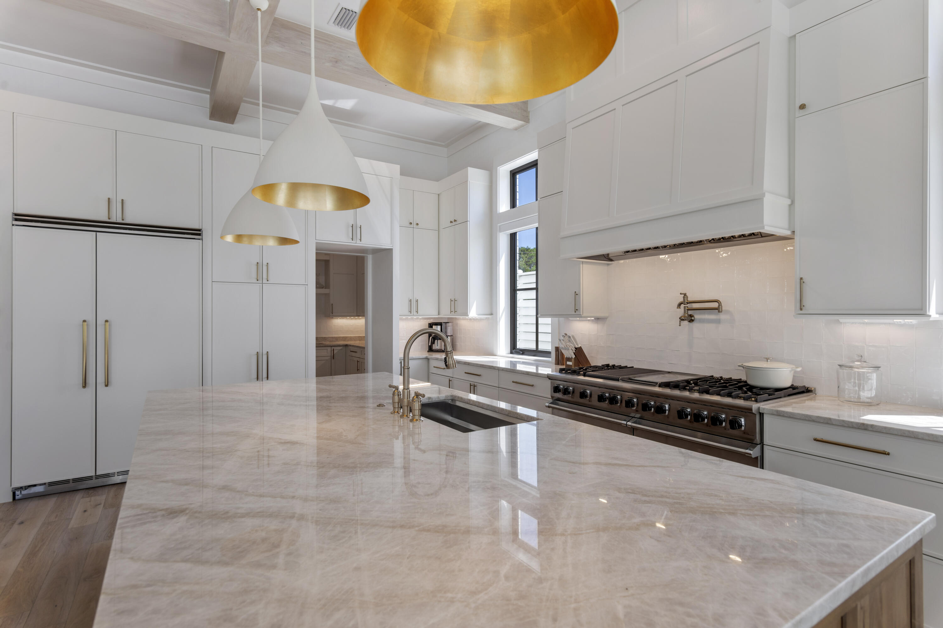 140 South Wall Street Inlet Beach, FL 32461 - Photo 35 of 85 a kitchen with stainless steel appliances granite countertop a sink a stove and a refrigerator