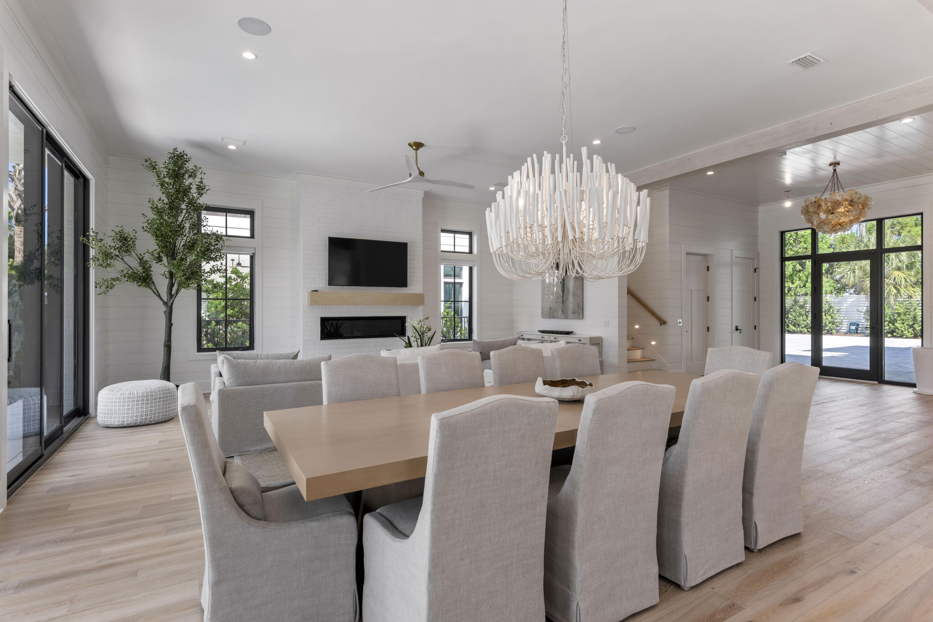 140 South Wall Street Inlet Beach, FL 32461 - Photo 37 of 85 a living room with fireplace furniture and a chandelier