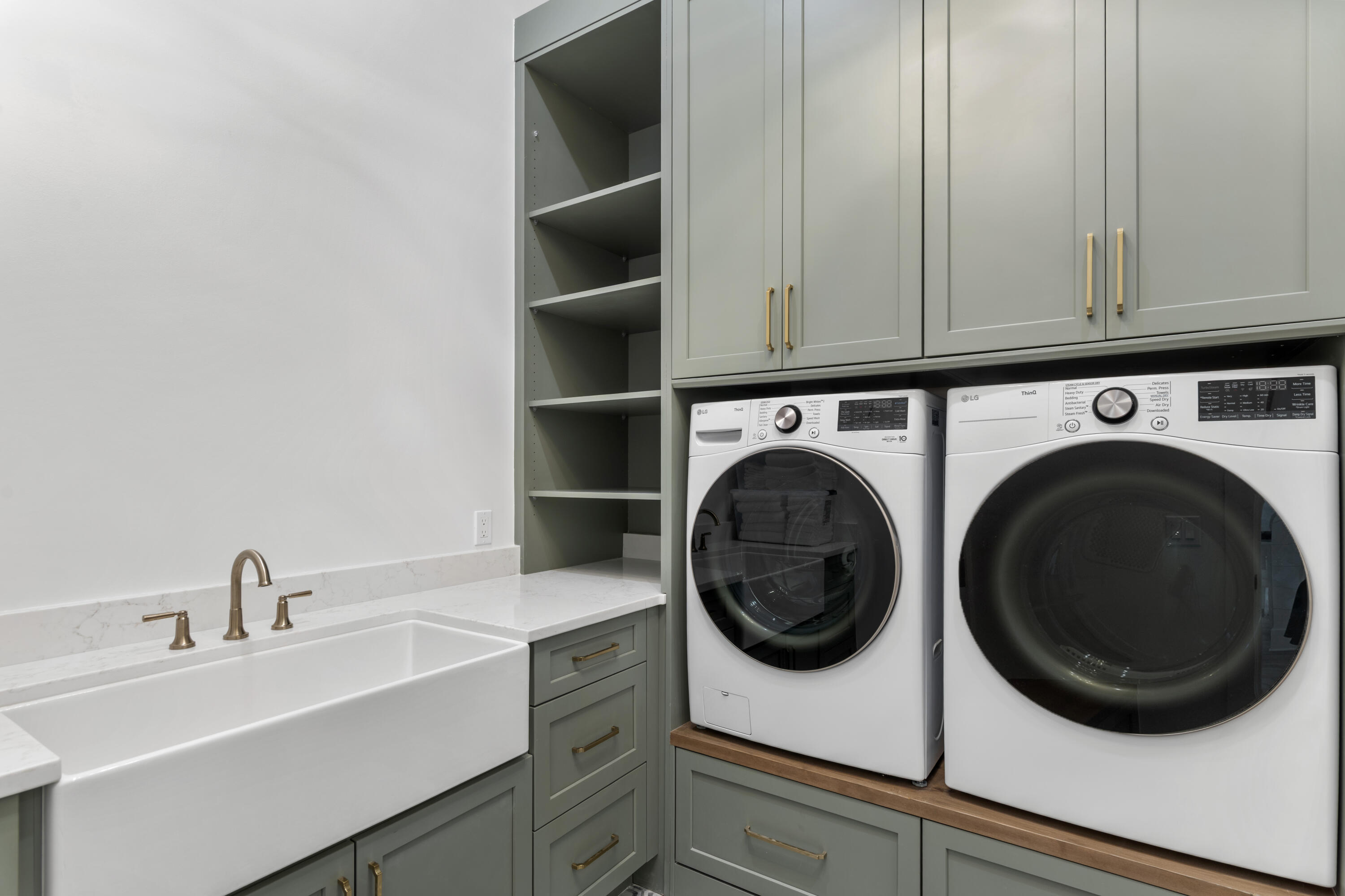 140 South Wall Street Inlet Beach, FL 32461 - Photo 40 of 85 a utility room with sink dryer and washer