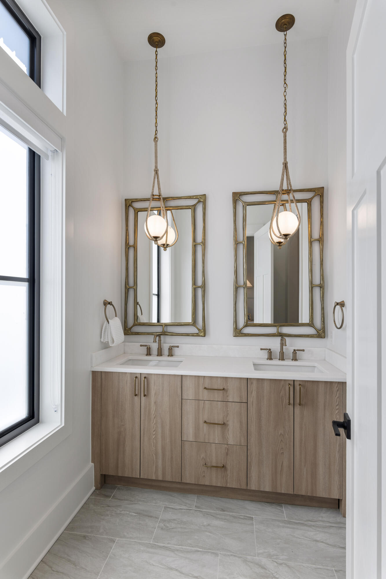 140 South Wall Street Inlet Beach, FL 32461 - Photo 41 of 82 a bathroom with double vanity and a mirror