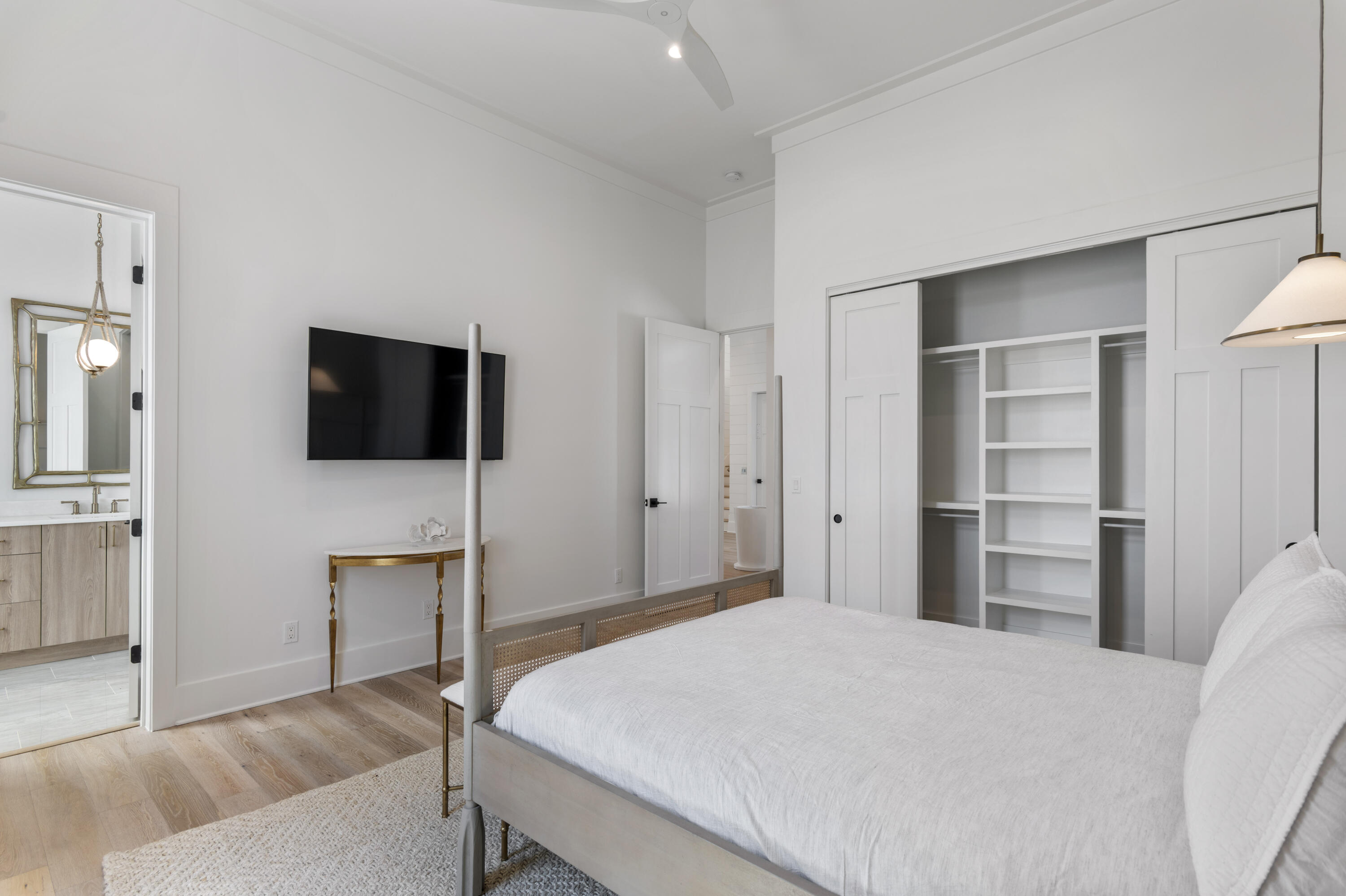 140 South Wall Street Inlet Beach, FL 32461 - Photo 43 of 85 a bedroom with a bed and a flat screen tv