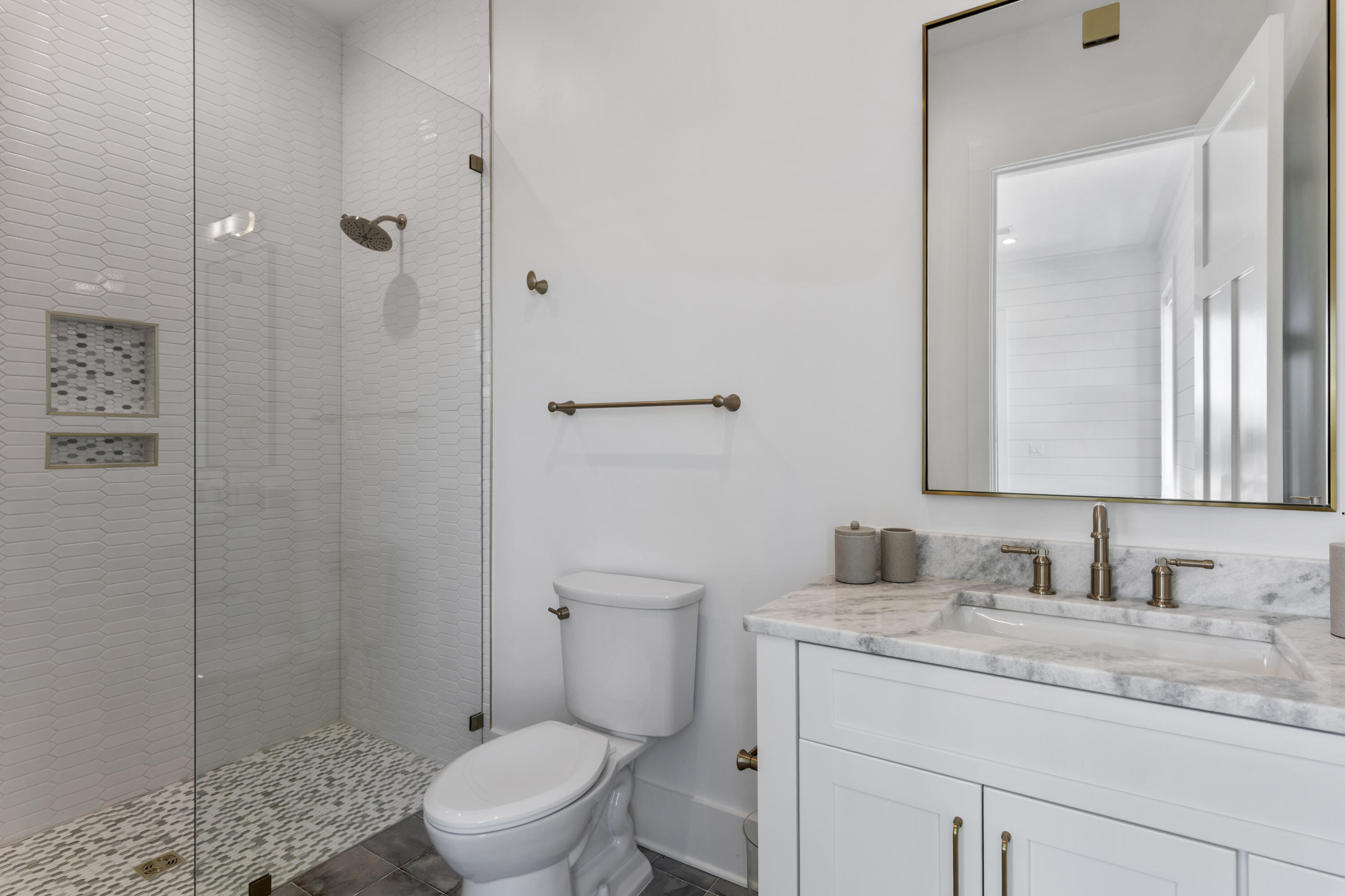 140 South Wall Street Inlet Beach, FL 32461 - Photo 49 of 82 a bathroom with a granite countertop sink a toilet and shower