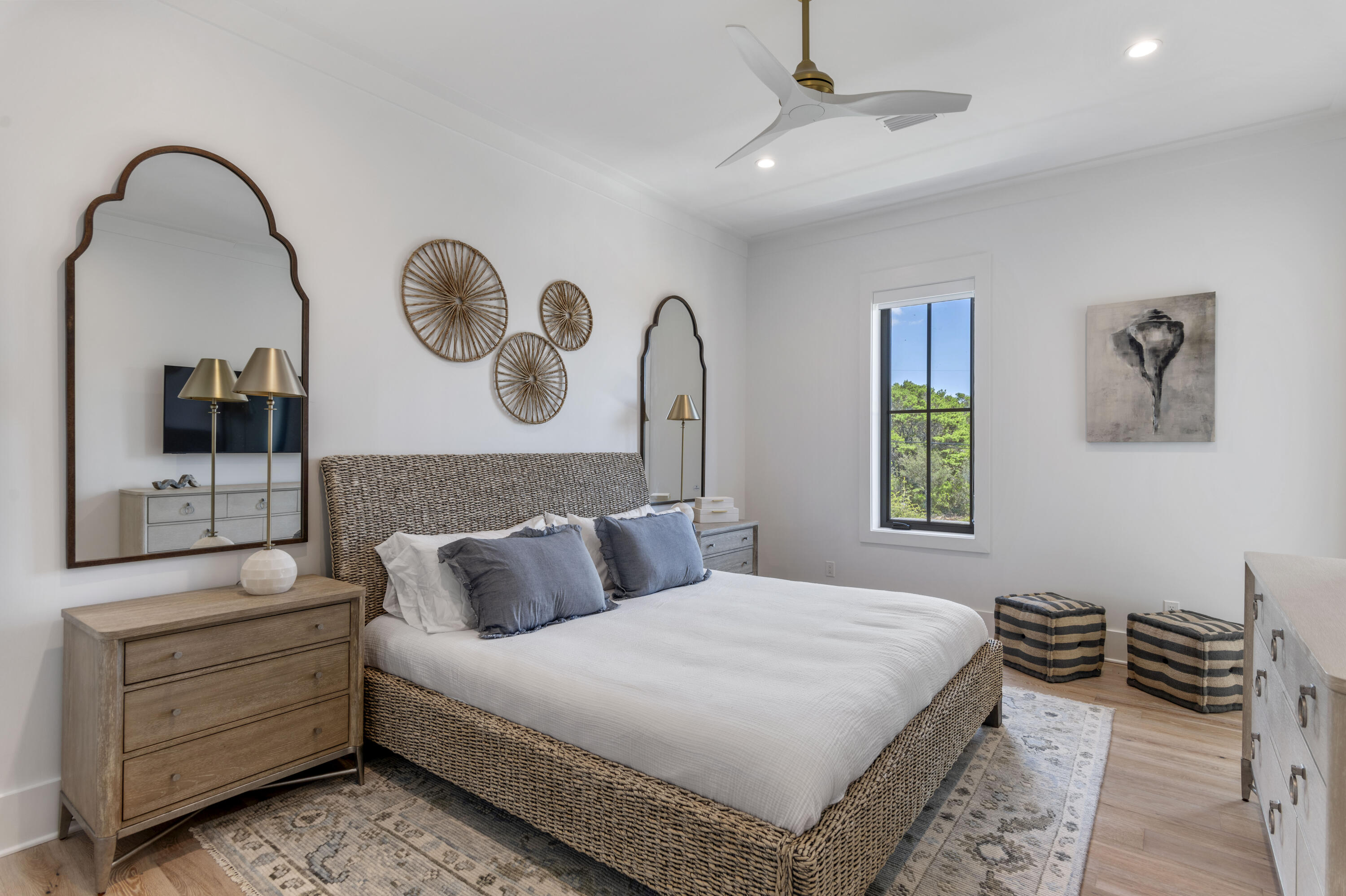 140 South Wall Street Inlet Beach, FL 32461 - Photo 53 of 82 a bedroom with a bed and a painting on the wall