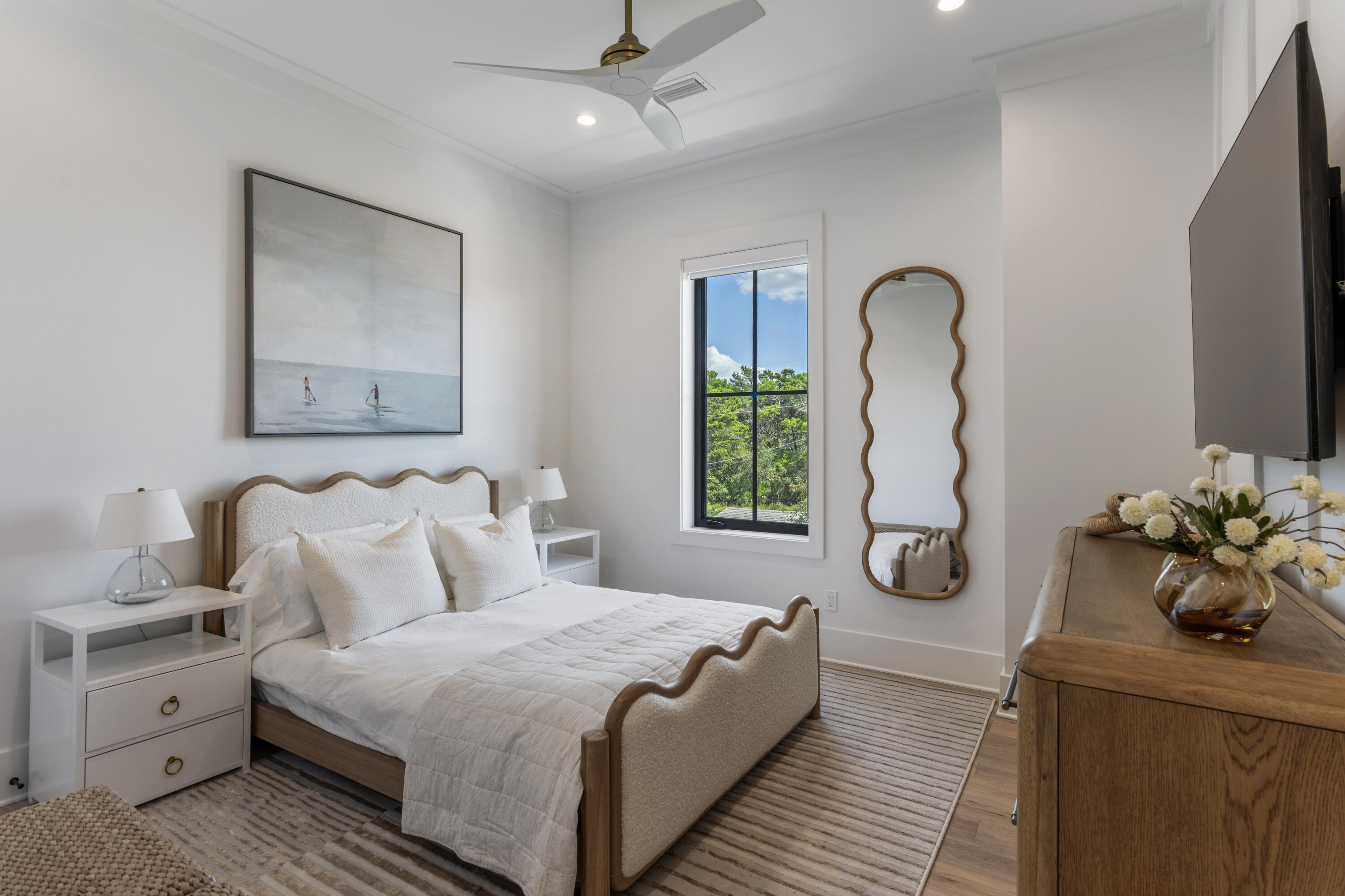 140 South Wall Street Inlet Beach, FL 32461 - Photo 57 of 82 a bedroom with a bed and a chandelier