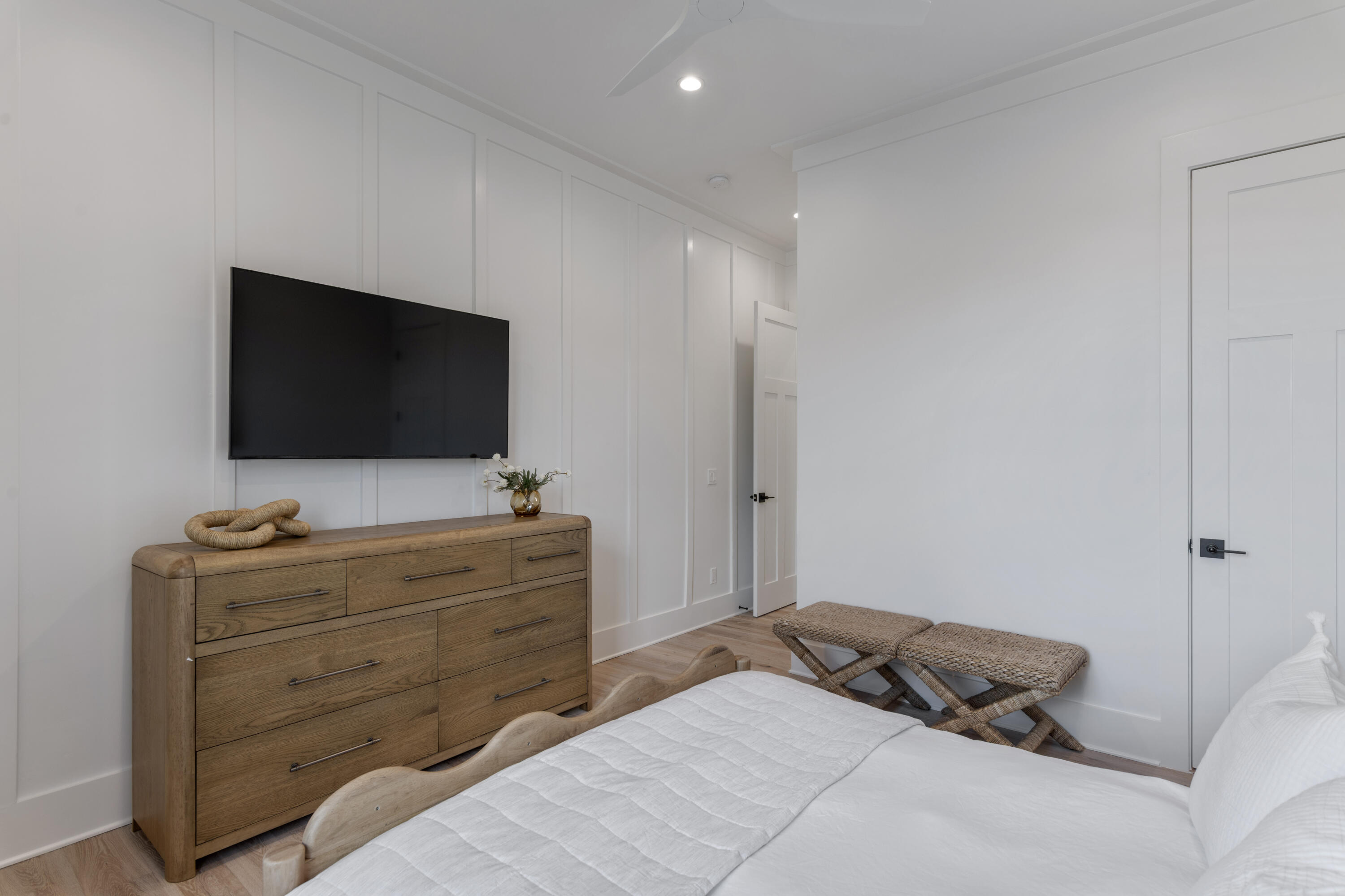 140 South Wall Street Inlet Beach, FL 32461 - Photo 58 of 82 a bedroom with a bed and a flat screen tv