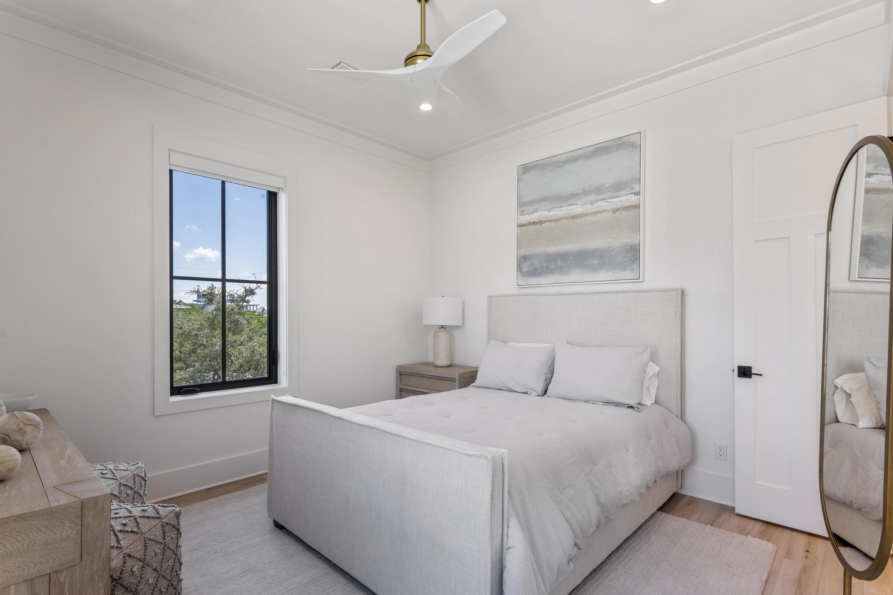 140 South Wall Street Inlet Beach, FL 32461 - Photo 60 of 82 a bedroom with a bed and a window