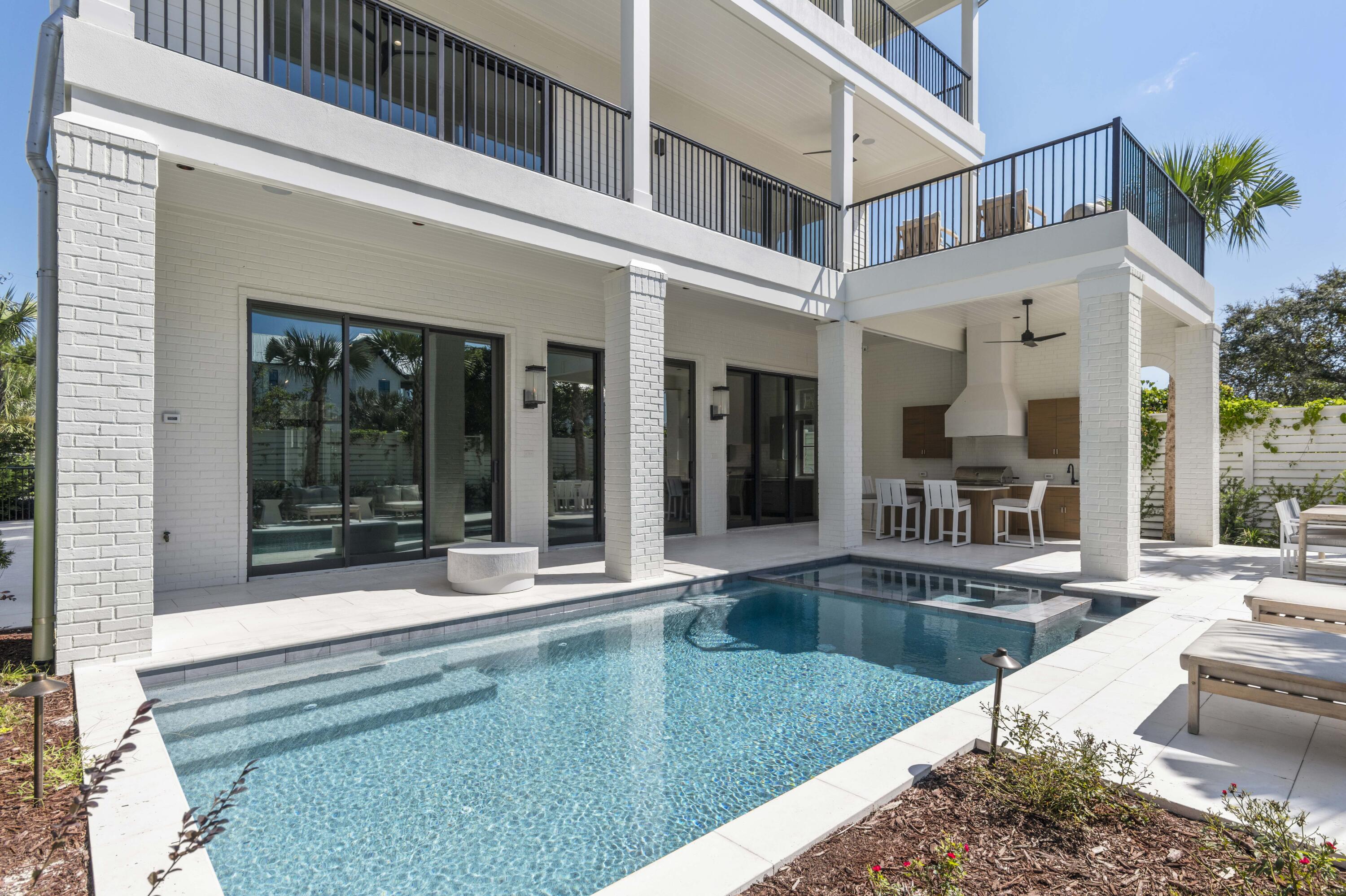 140 South Wall Street Inlet Beach, FL 32461 - Photo 6 of 82 a view of a house with a swimming pool and sitting area