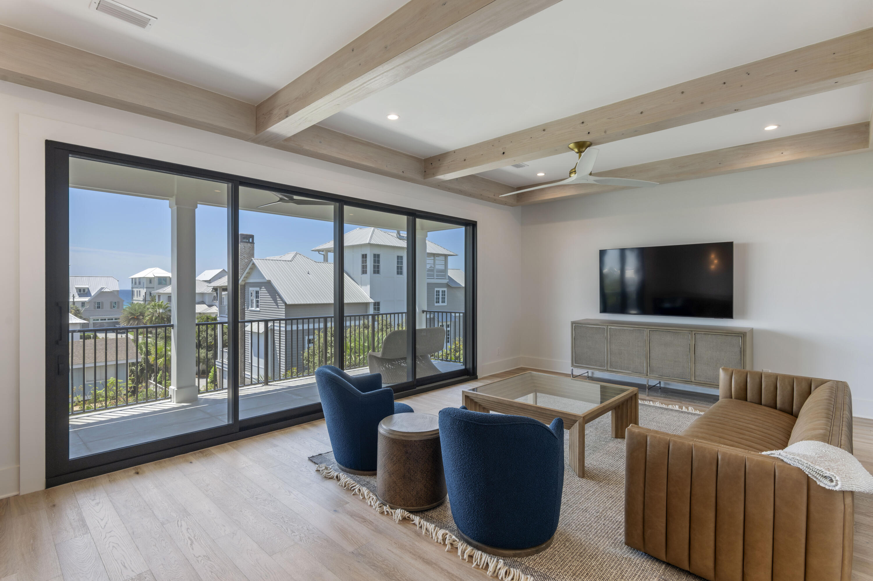 140 South Wall Street Inlet Beach, FL 32461 - Photo 65 of 85 a living room with furniture and a flat screen tv