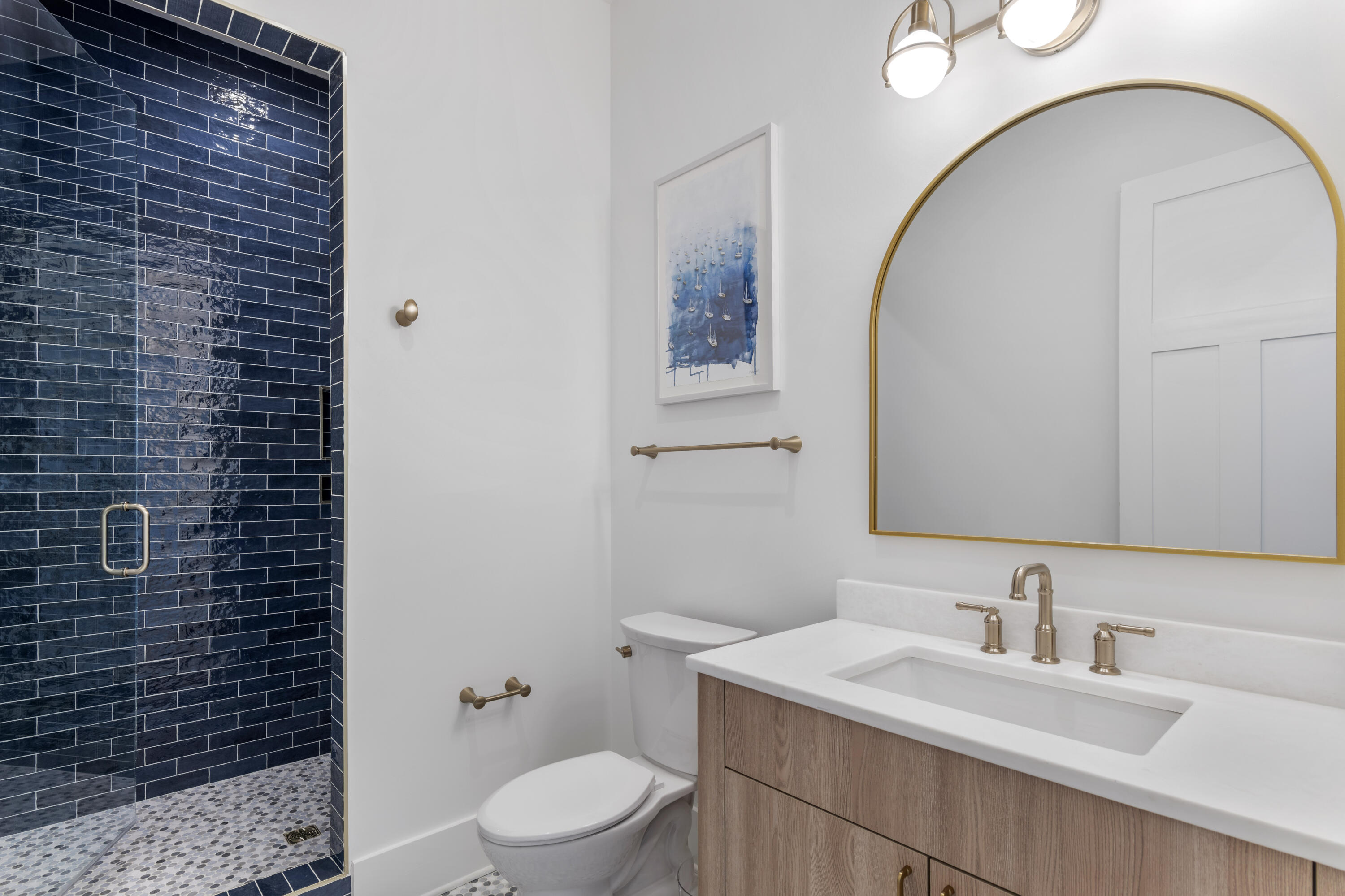 140 South Wall Street Inlet Beach, FL 32461 - Photo 73 of 82 a bathroom with a sink a toilet and a mirror