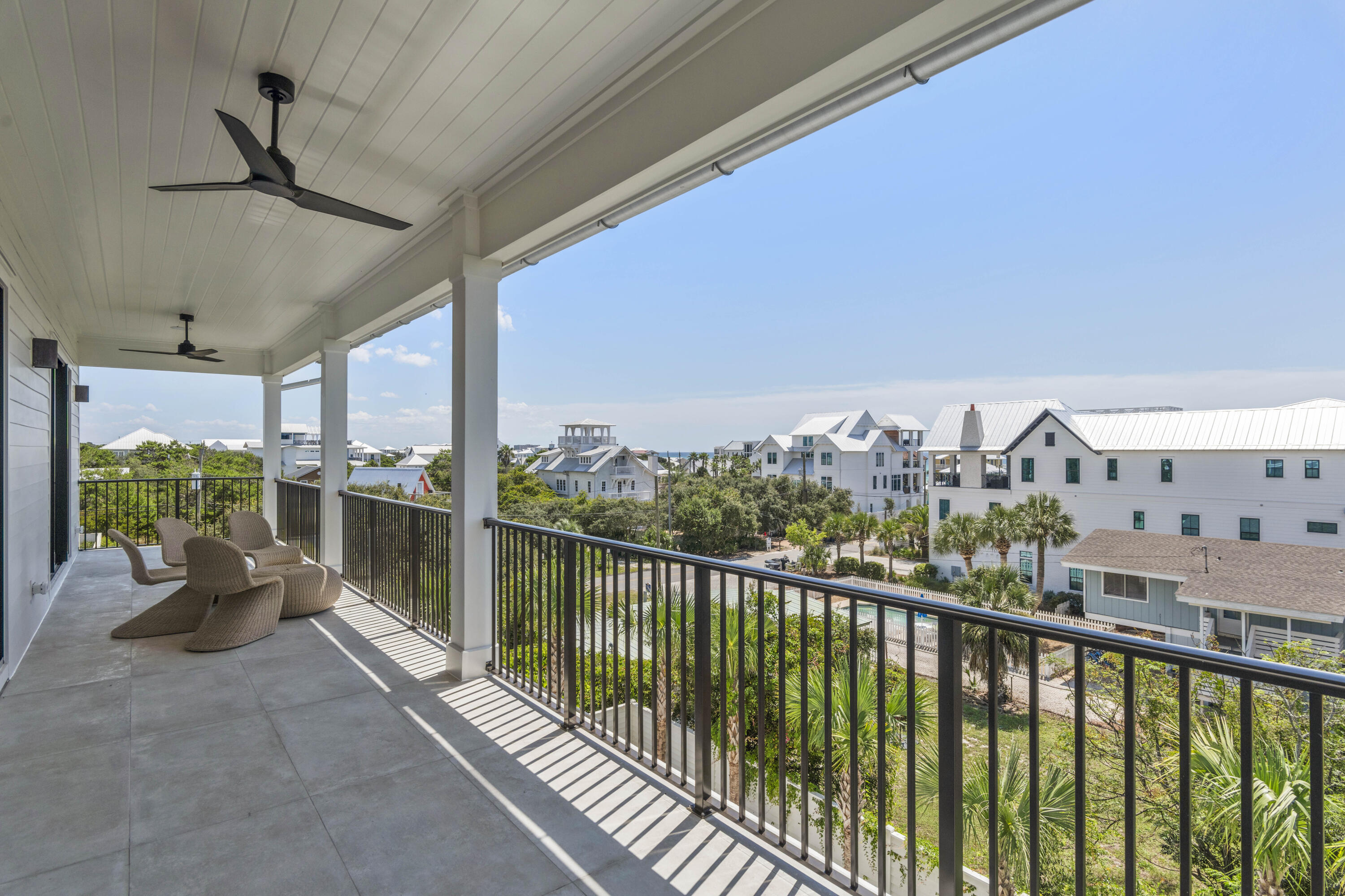 140 South Wall Street Inlet Beach, FL 32461 - Photo 77 of 85 a view of a balcony with chairs