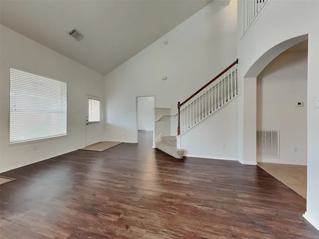 a view of entryway with wooden floor